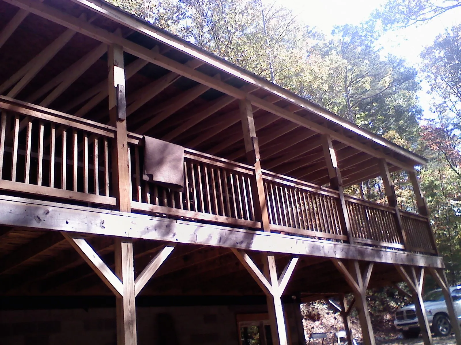 Timber framing under a new elevated porch and deck — Roof Leak Repair in Round Top by Roofing Brothers